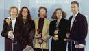 members of the rock group The Doors pose after being inducted in the Rock and roll hall of Fame duri..