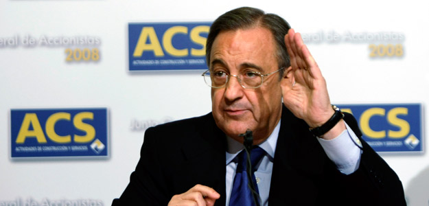 Perez, chairman of ACS, gestures during a news conference after company's annual shareholders meeting in Madrid
